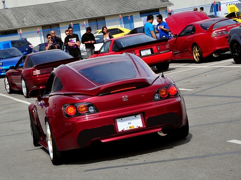 A fastback style Honda S2000 not gonna lie i think it looks amazing  especially in a black and white body with that engine bay stuffed full of  red chrome accents 👌 Fully